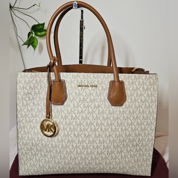 Michael Kors Handbags - FIRM! EUC Big MK Leather Handbag